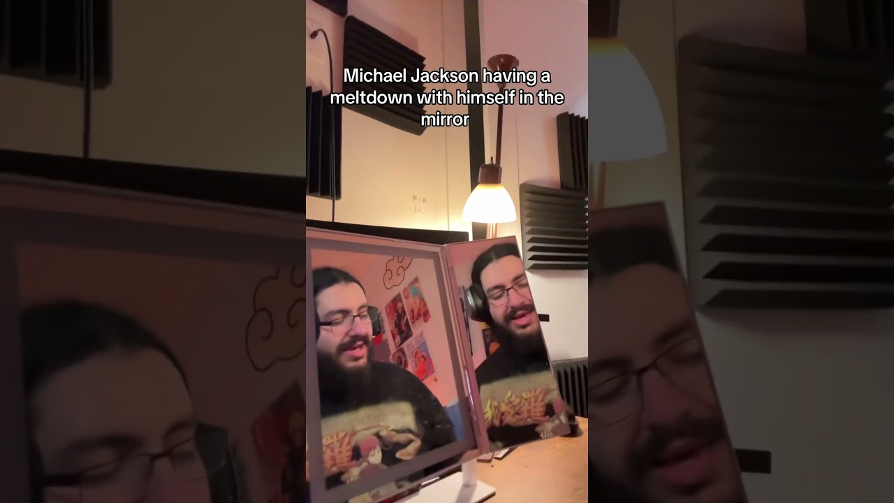 Michael Jackson having a meltdown with himself in the mirror